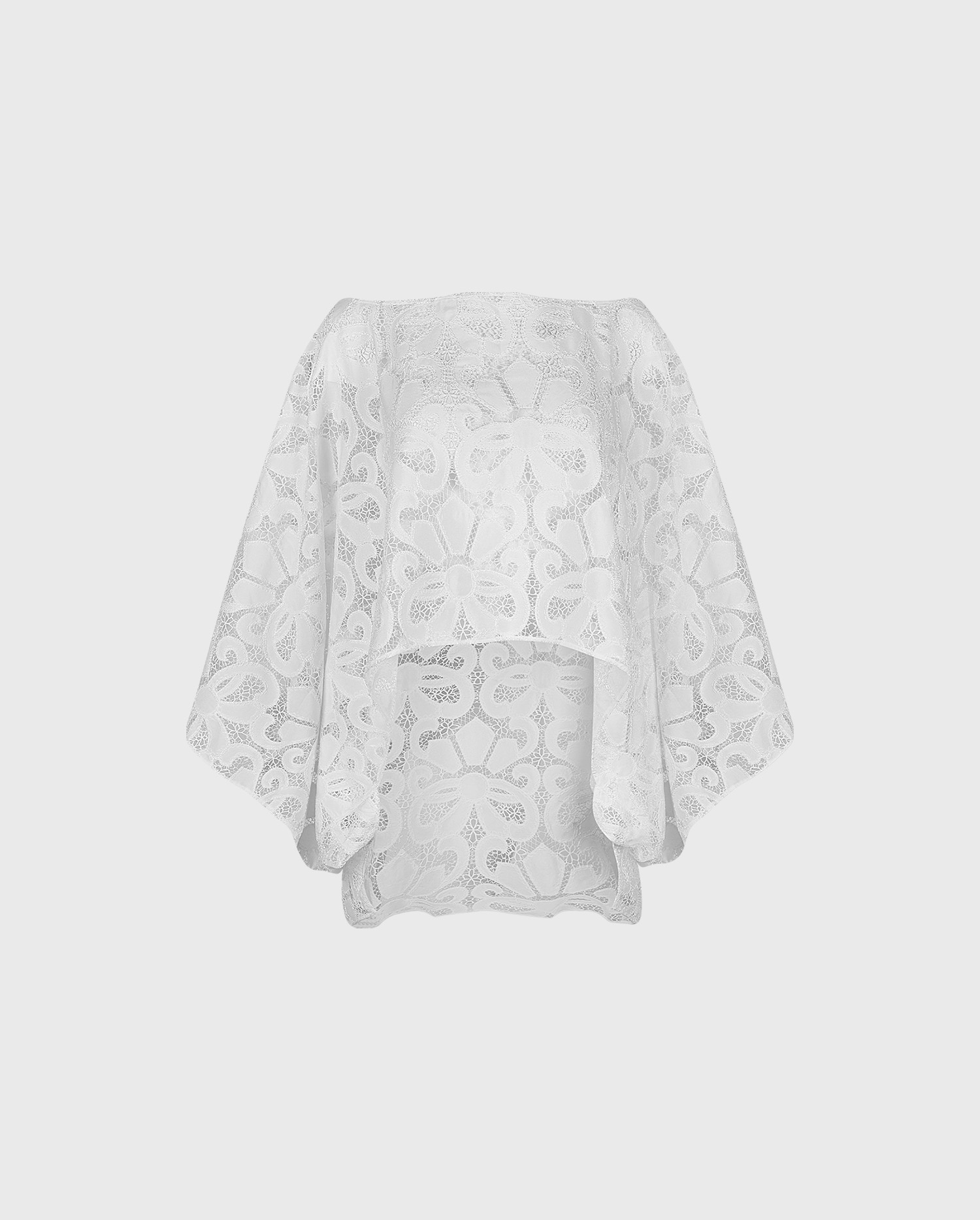 Discover the Corinne White Oversized Hi-Low Sheer Lace Blouse With Floral Pattern from designer ANNE FONTAINE