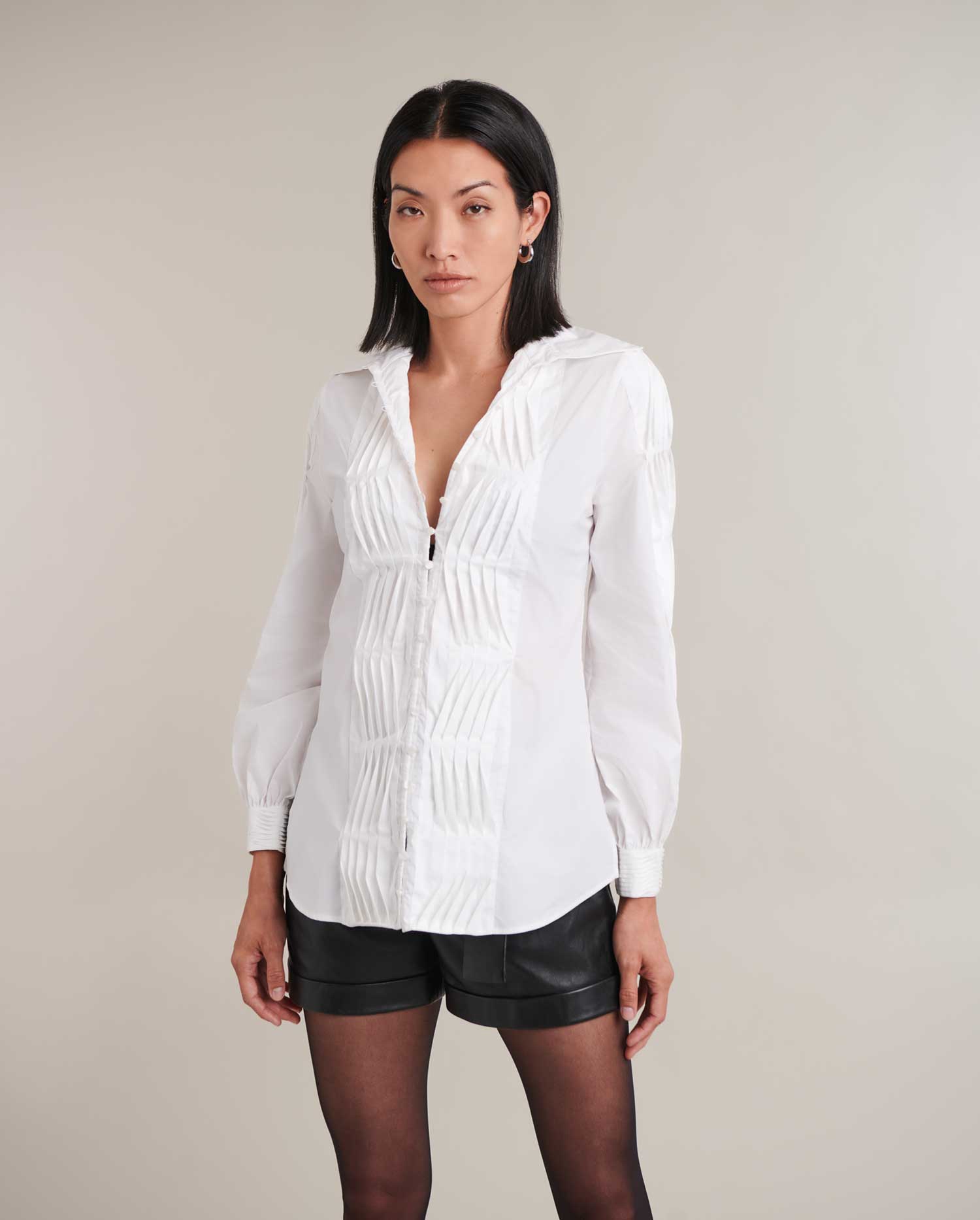 Discover the Elodie White Long Sleeve Shirt Featuring Pintuck Design Along Front And Sleeves from designer ANNE FONTAINE