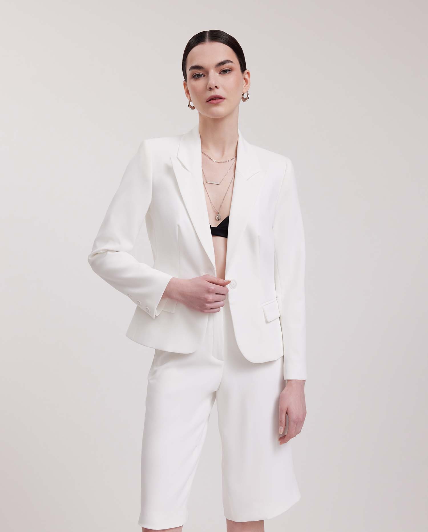 Discover the Lido Off-White Textured Crepe Jacket With Geometric Button from designer ANNE FONTAINE