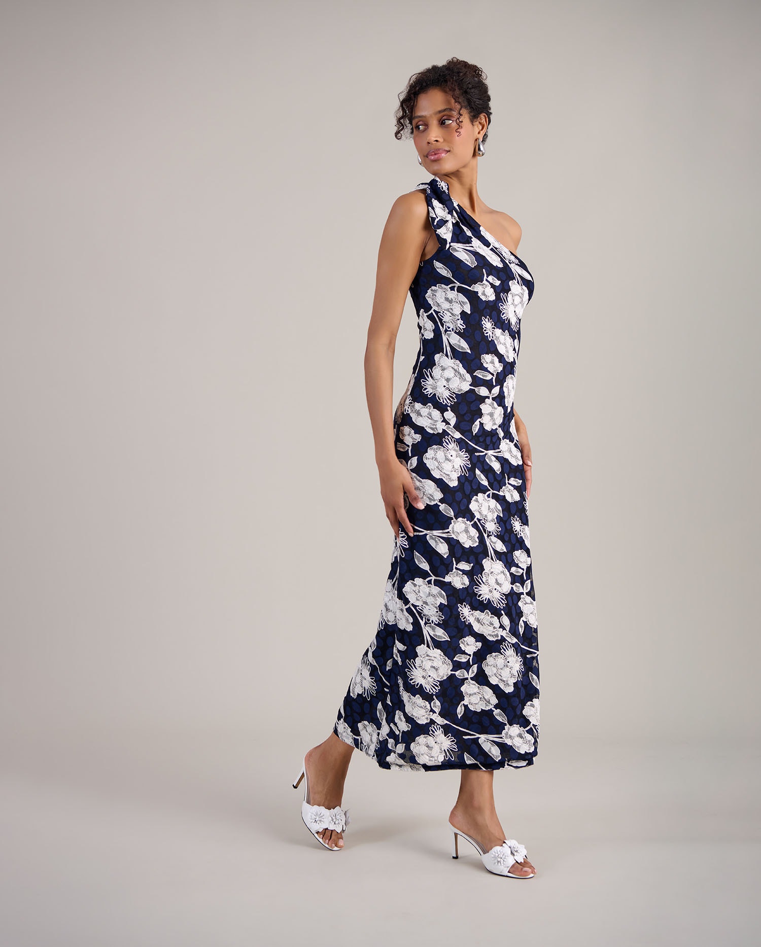 Discover the OLINDA Blue and White One Shoulder Floral Lace Fitted Maxi Dress from designer ANNE FONTAINE