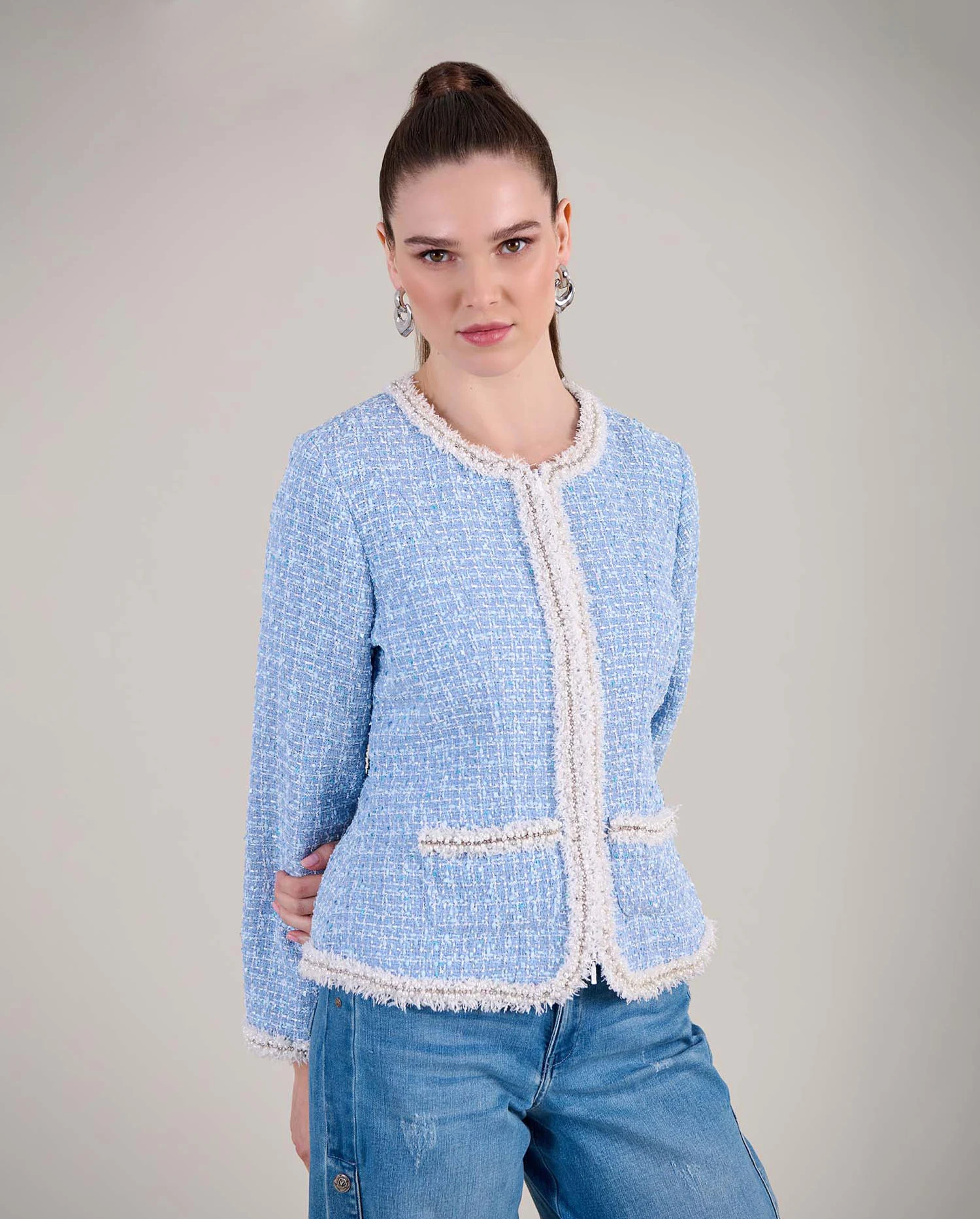 Discover the ROBYN Blue Structured Tweed Jacket With White Pearl And Crystal Trim from designer ANNE FONTAINE