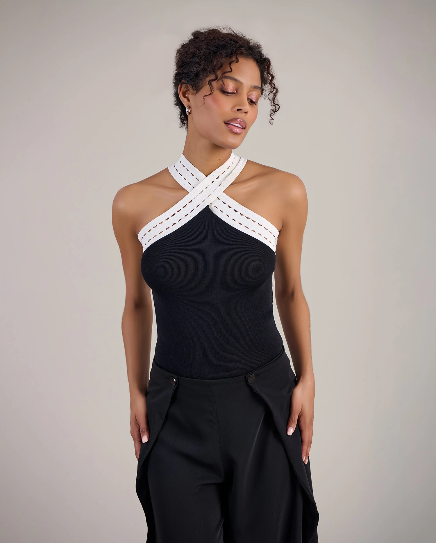 Discover the Silvia Black & White Viscose Knit Top With Criss Cross Neckline from designer Anne Fontaine