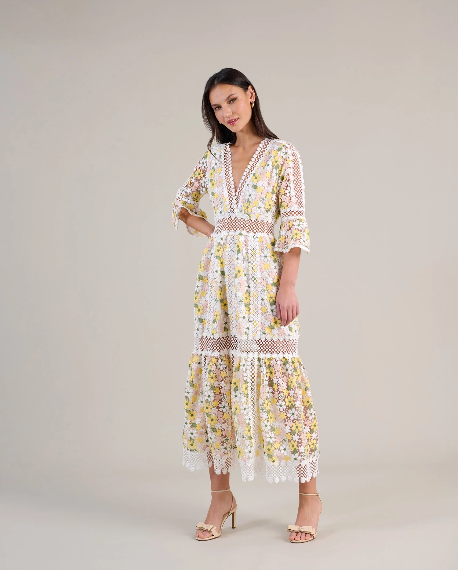 Discover the Susana Pastel Yellow Long Floral Lace Dress With Elbow Length Ruffle Sleeve and Daisy Lattice Trim from designer Anne Fontaine
