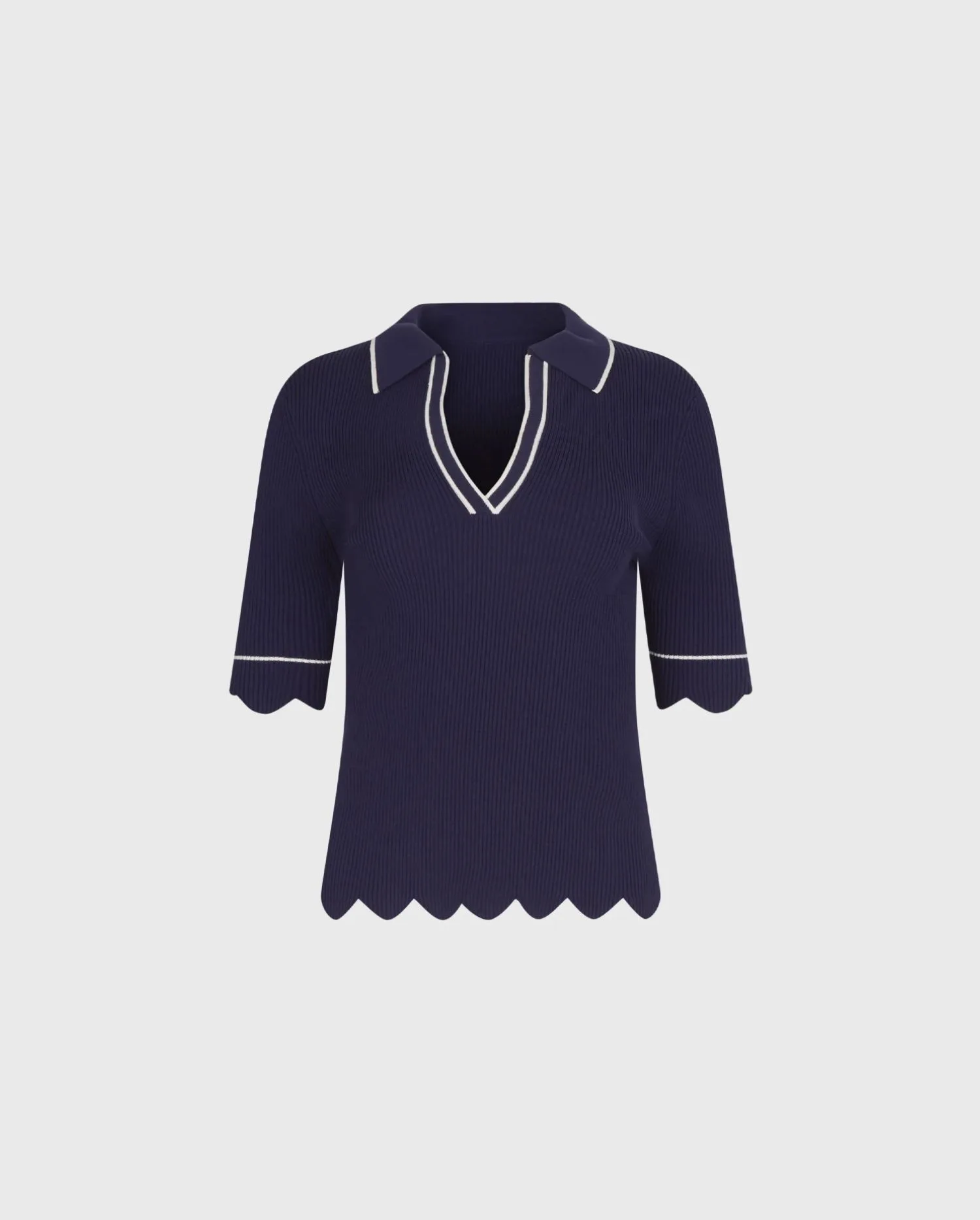 Discover the SARITA Navy 3/4 Sleeve Knit Pullover Top With V-Neckline, Scalloped Hem and White Contrasting Piping by designer ANNE FONTAINE