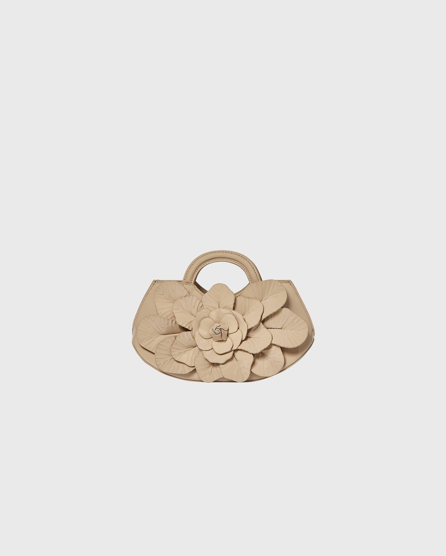 Discover the Scarlett Nude Leather Mini Floral Handbag from designer ANNE FONTAINE