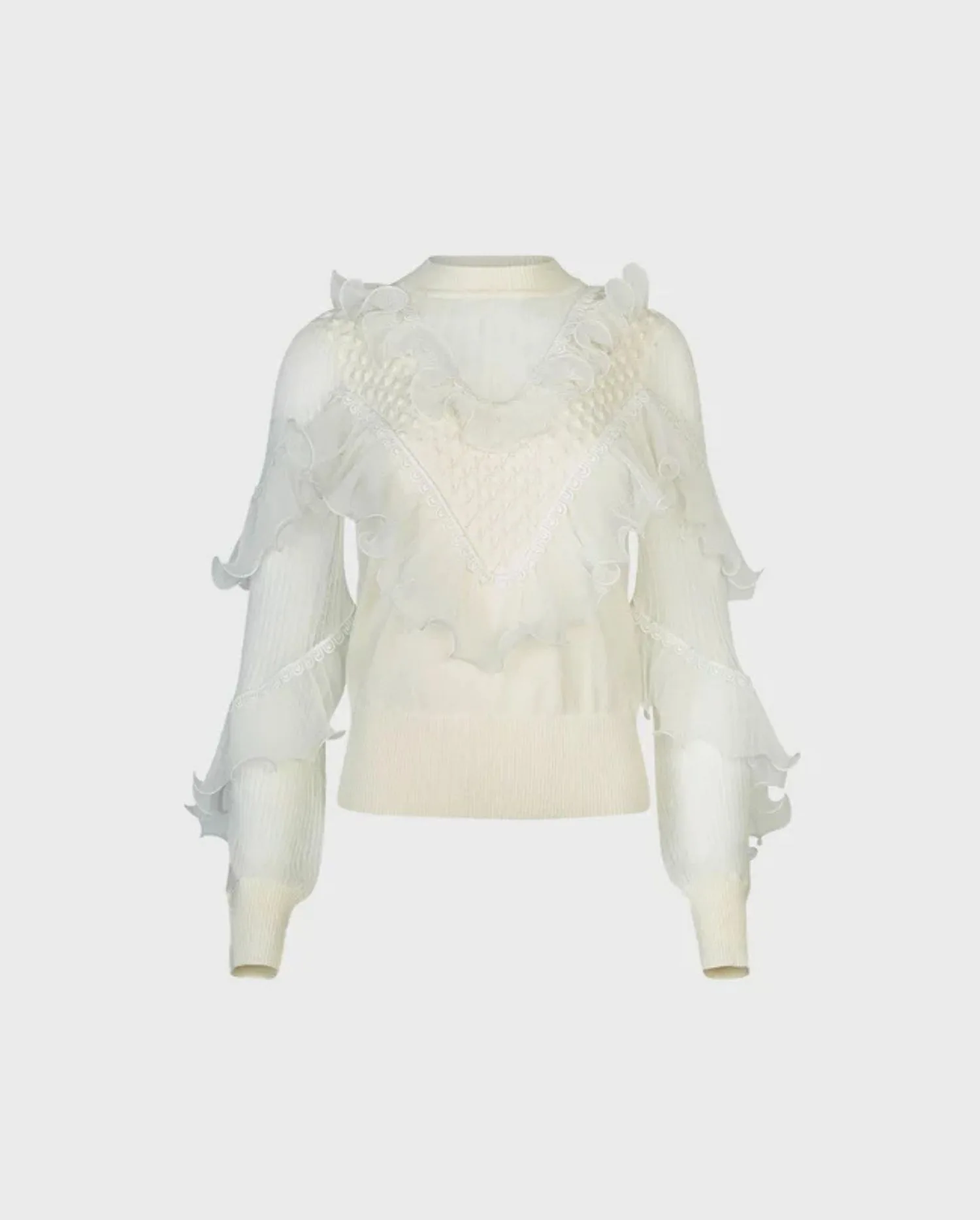 Discover the OEUVRE White Long Sleeve Knit With Sheer Details & Cascading Ruffles by designer ANNE FONTAINE