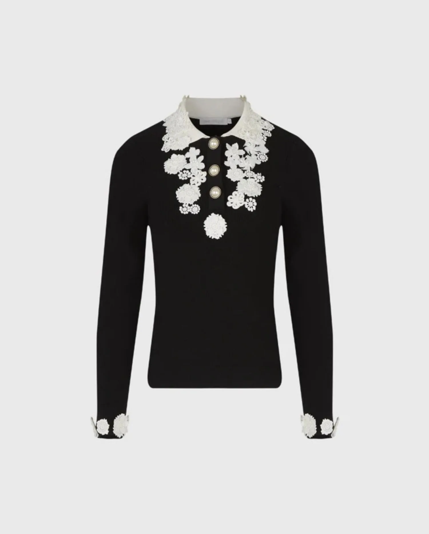 Discover the SWEETIE Black Knit Pullover with White Collar and Lace Floral Details by designer ANNE FONTAINE