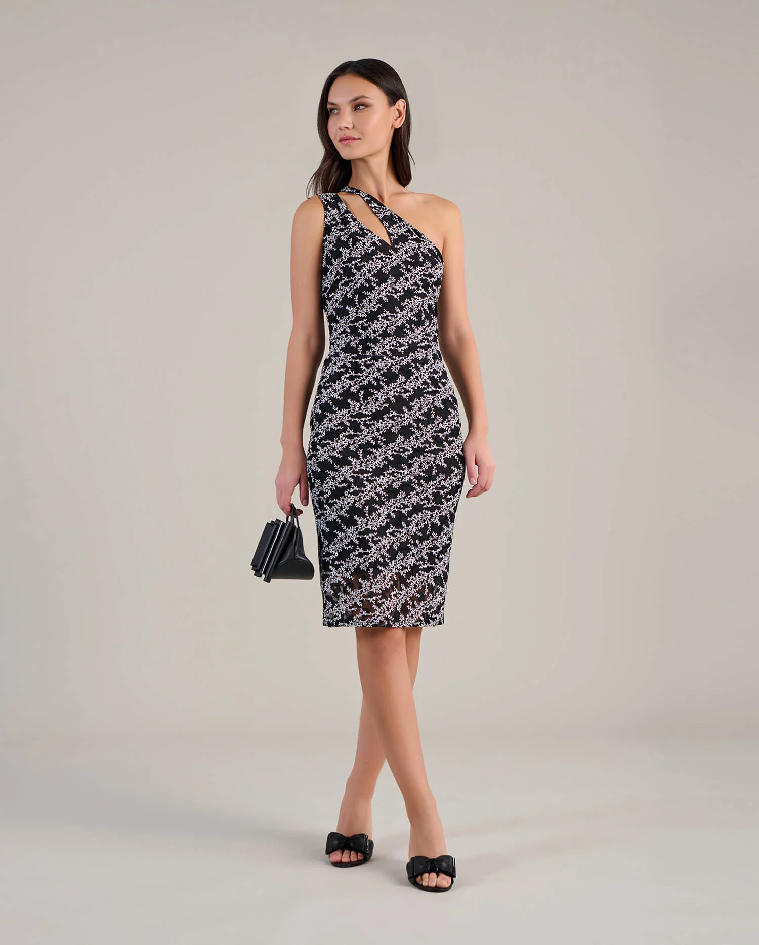 Discover the THALYA Black Sheer Mesh Midi Dress With Black Polka Dot and White Leaf Pattern from designer ANNE FONTAINE