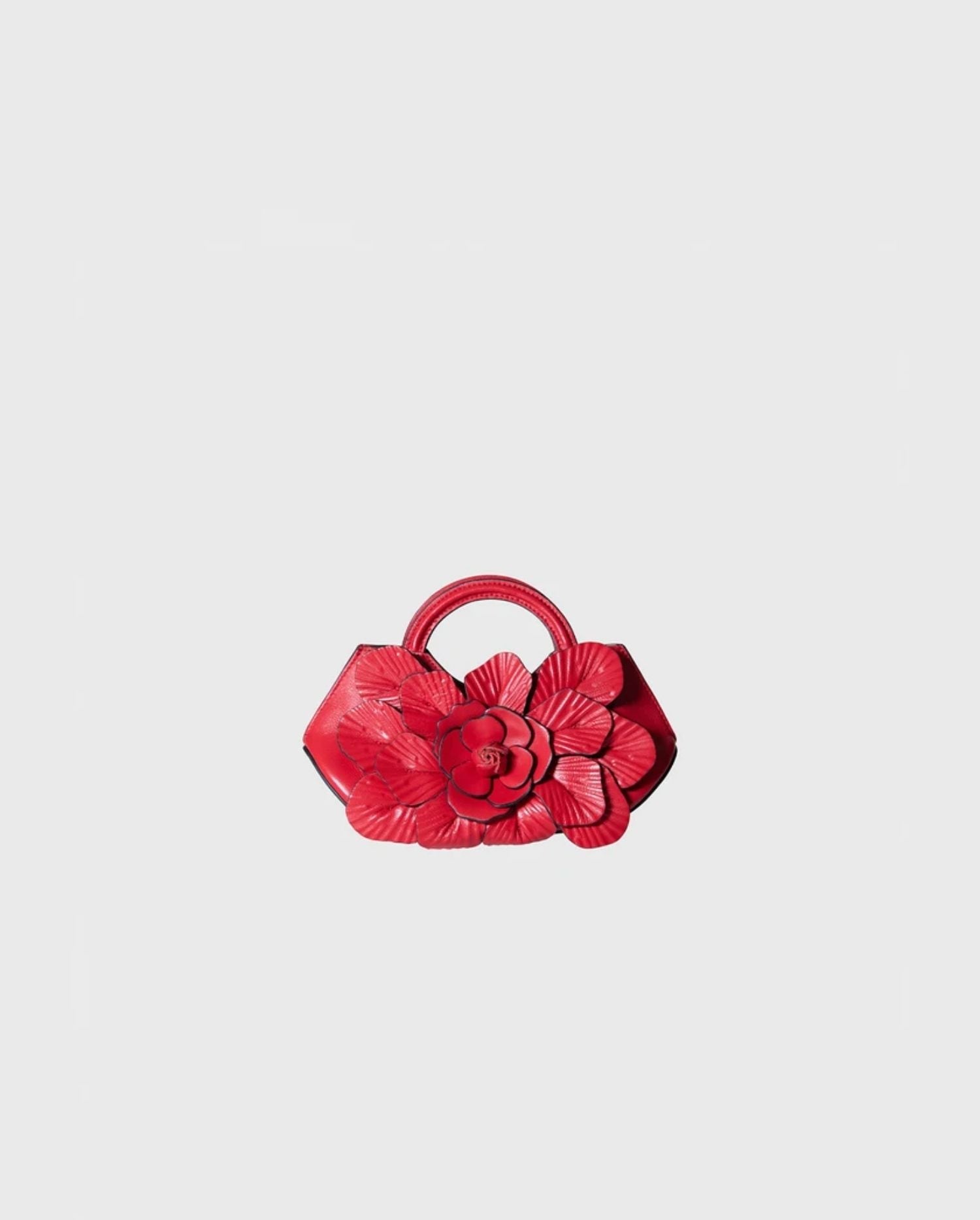 Discover the Scarlett Signature Leather Mini Floral Handbag in Red by designer ANNE FONTAINE