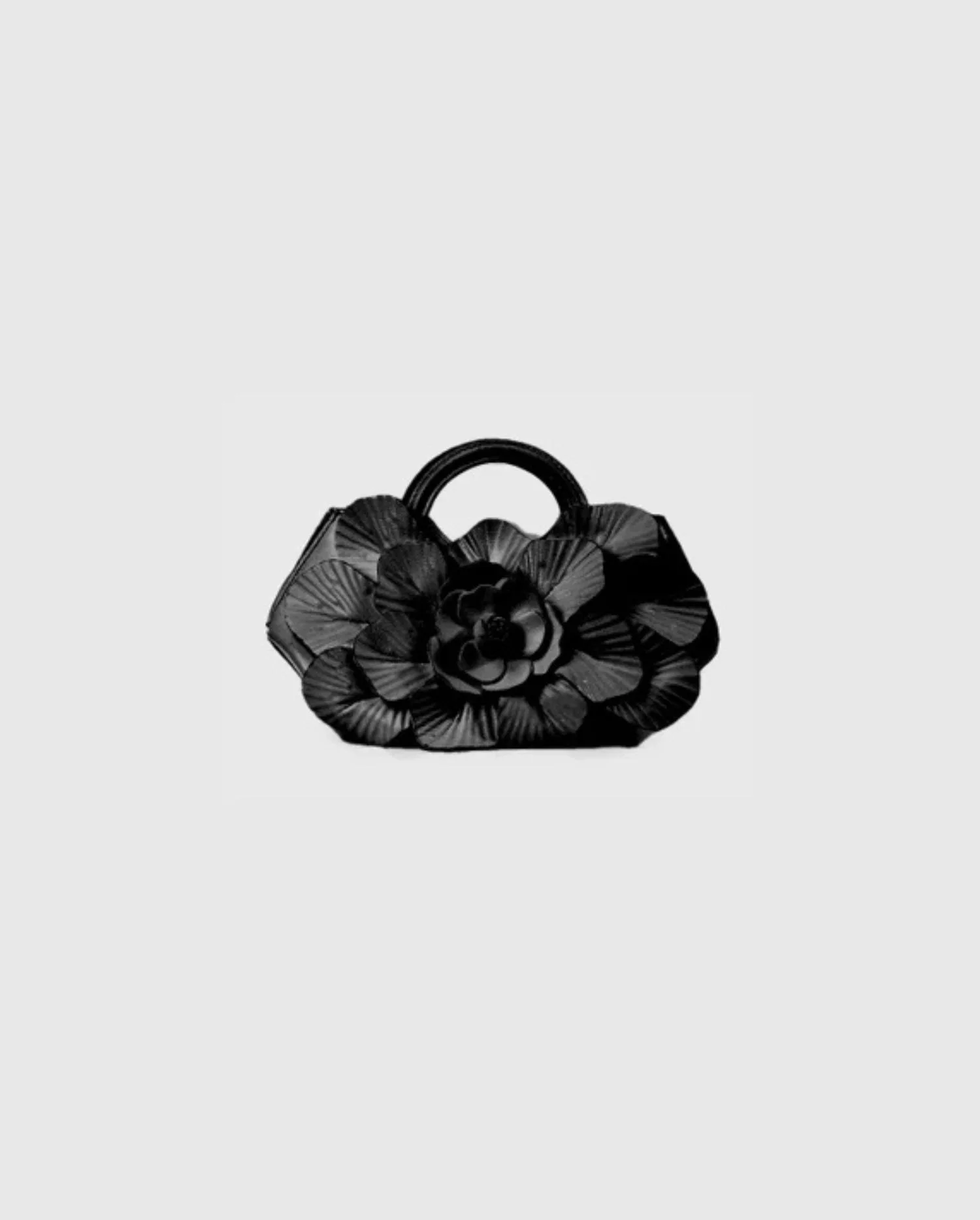 Discover the SCARLETT Signature Black Floral MIniature Leather Handbag with Rounded Handles by designer ANNE FONTAINE