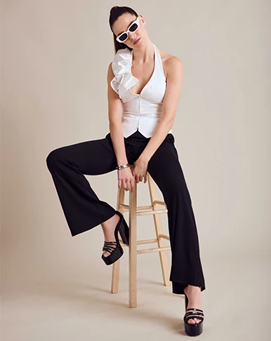 Step into a world where elegance meets versatility as we delve into the timeless allure of the white shirt - a quintessential piece for your summer wardrobe.