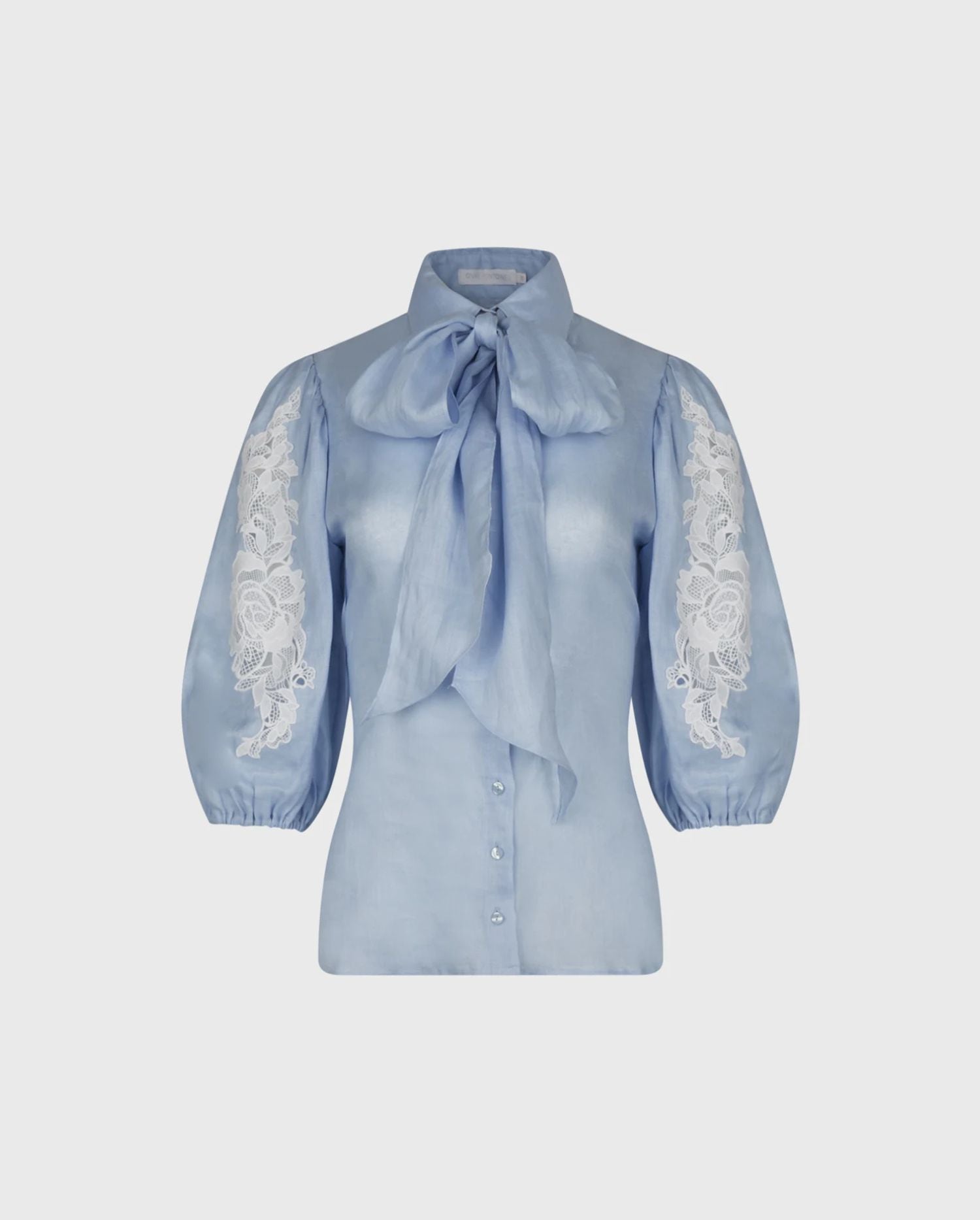Discover the Abbie Light Blue Balloon Sleeve Linen Shirt With Lace Inserts and Removable Neck Tie from designer Anne Fontaine