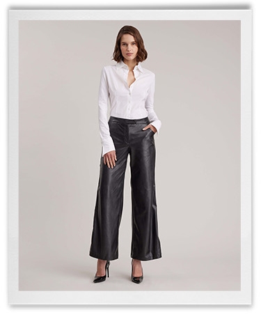 Discover the ESTHETE Wide Leg Faux Leather Pant Featuring Side Snap Details