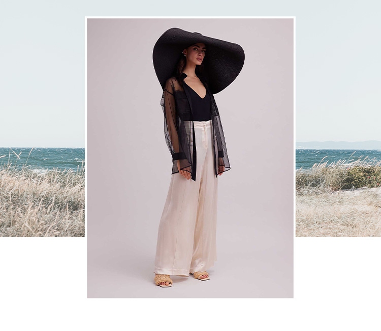 Discover the BRASILIA Sheer Black Oversized Shirt With Front Flap Pockets from ANNE FONTAINE