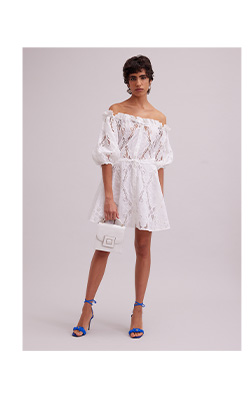 Discover the RIVIERA White off the Shoulder Embroidered Eyelet Dress With Removable Belt