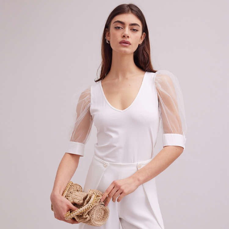 Discover the AERIAL White V-Neck Top With Sheer Mesh Sleeves