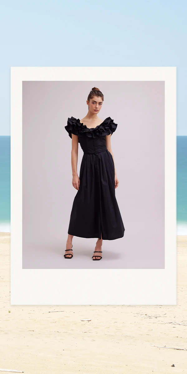 Explore some of Anne's favorite silhouettes from the season, including: signature dresses, tailored jackets, timeless accessories, must-have bottoms and ruffled tops in our signature house colors of black and white. 