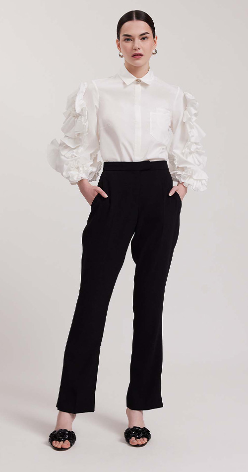 Discover the Isadora White 3/4 Sleeve Shirt With 3-D Ruffled Flowers from designer Anne Fontaine