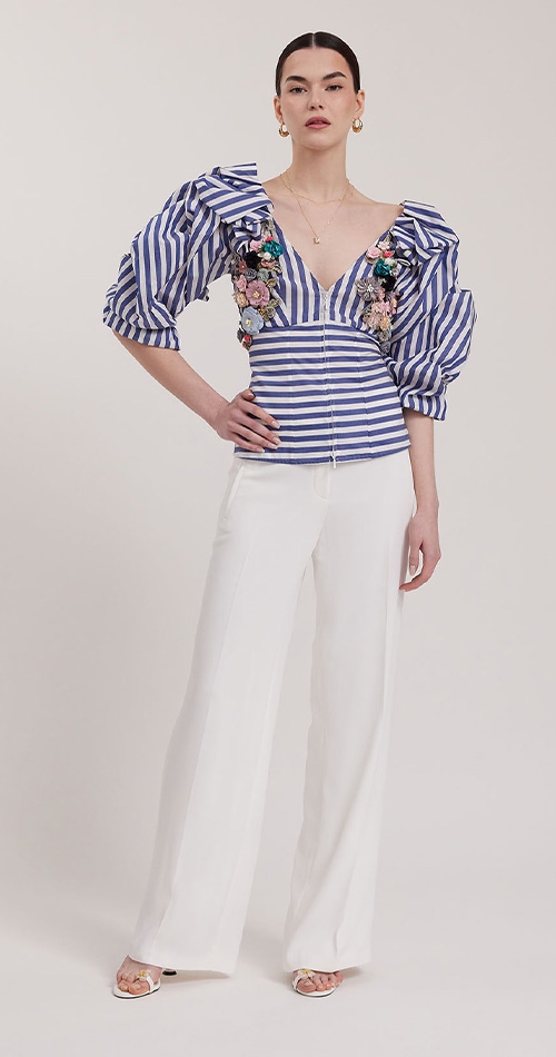 Discover the Tulipe Blue & White Striped Blouse With Exaggerated Sleeves & 3D Colorful Floral Applique & Corset Back from designer Anne Fontaine