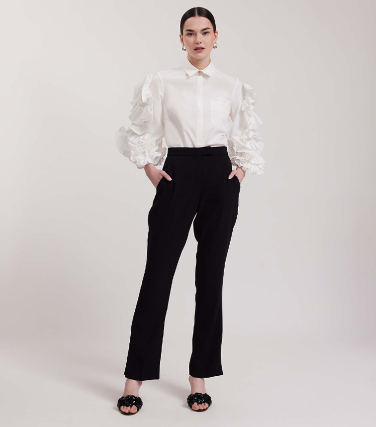 Discover the Isadora White 3/4 Sleeve Shirt With 3-D Ruffled Flowers from designer Anne Fontaine