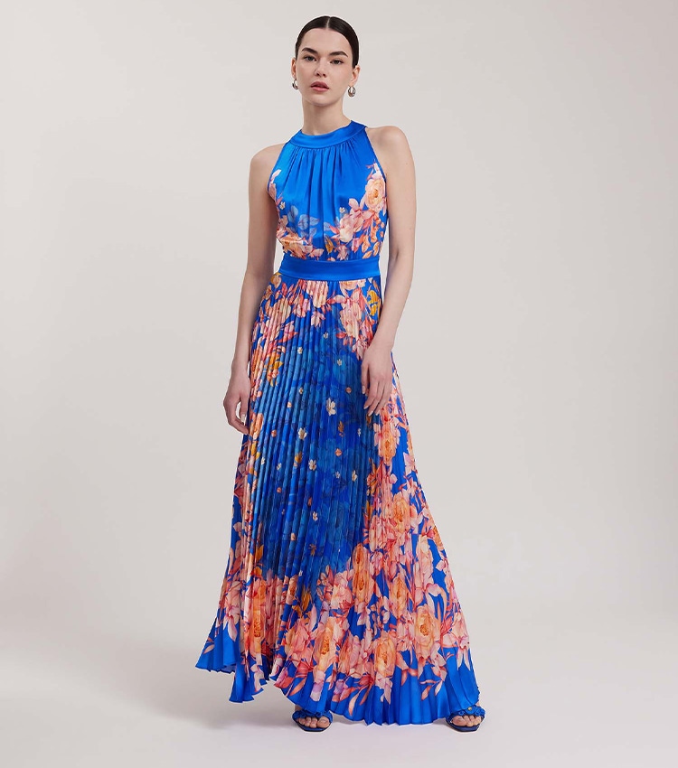 Discover the Enora Blue Silk Floral Print Halter Neck Maxi Dress With Pleats Below The Waistline from designer Anne Fontaine