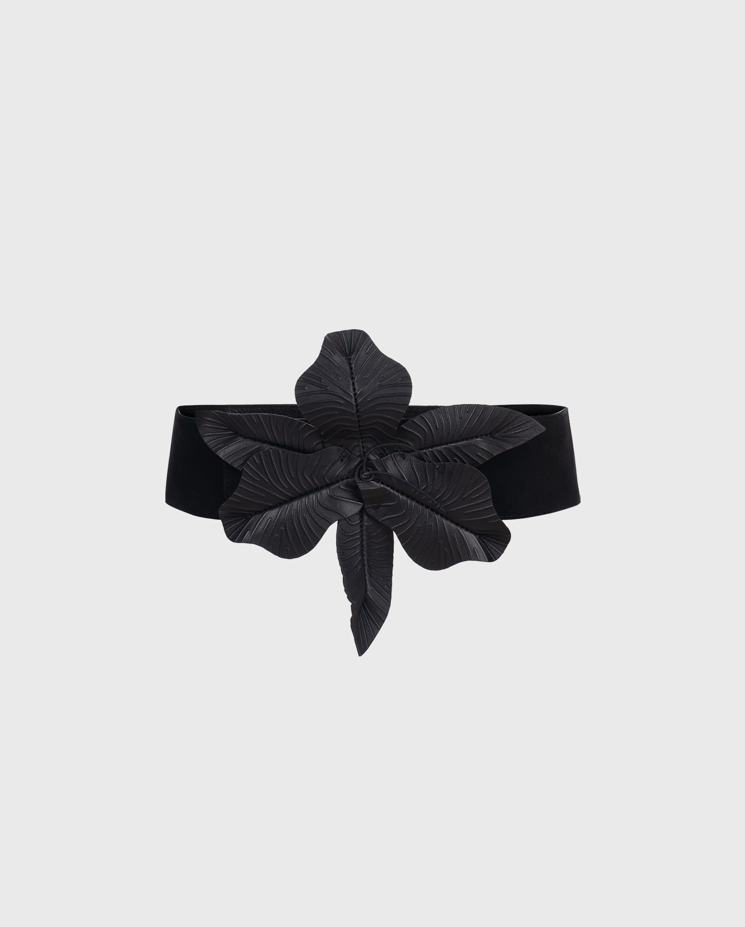 The Black CARRIE-TIFF Statment Floral Belt will add a statement of chic to your modern wardrobe.