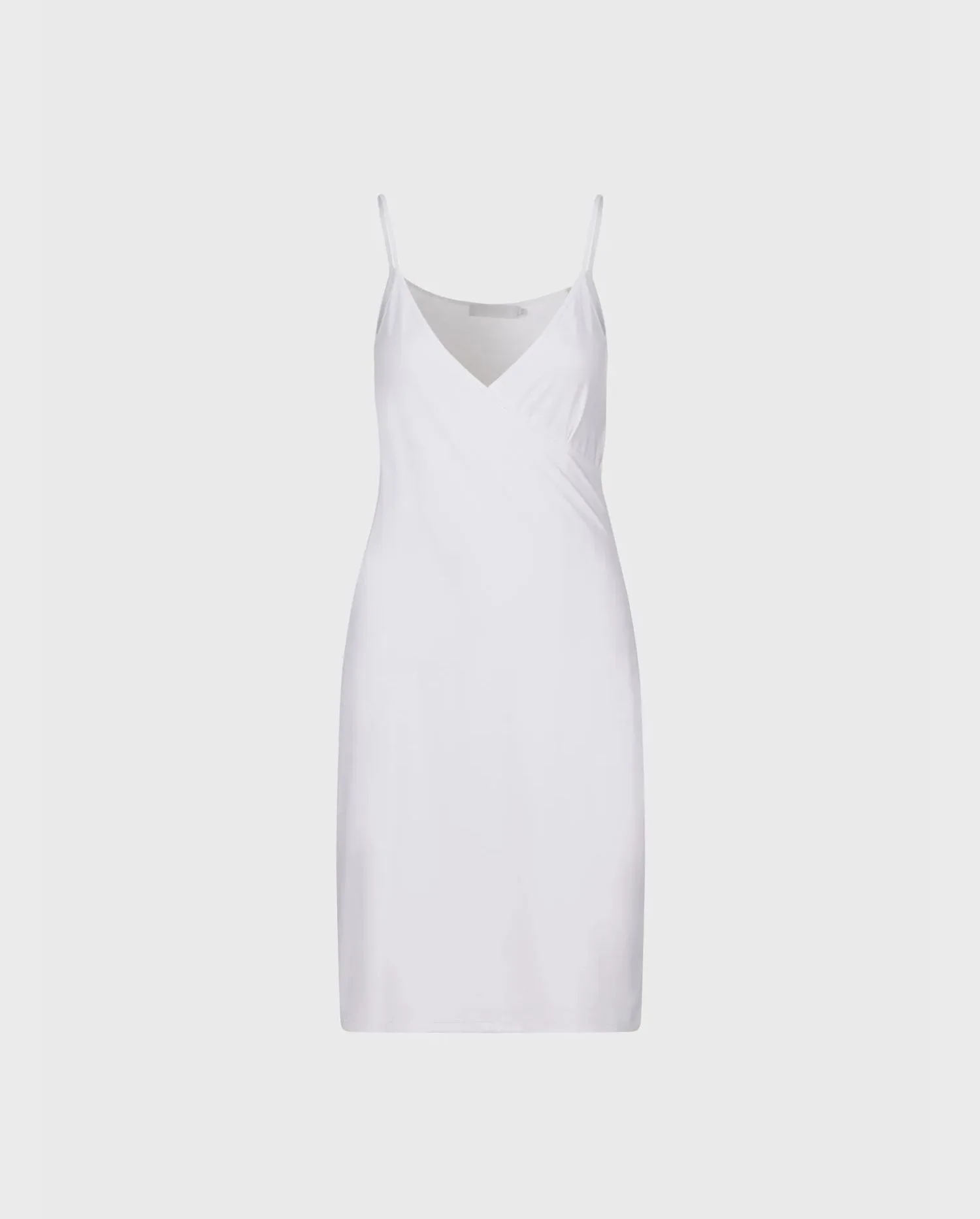 Discover the Chani White Slip Dress With Wrap Style Neckline and Thin Straps from designer ANNE FONTAINE