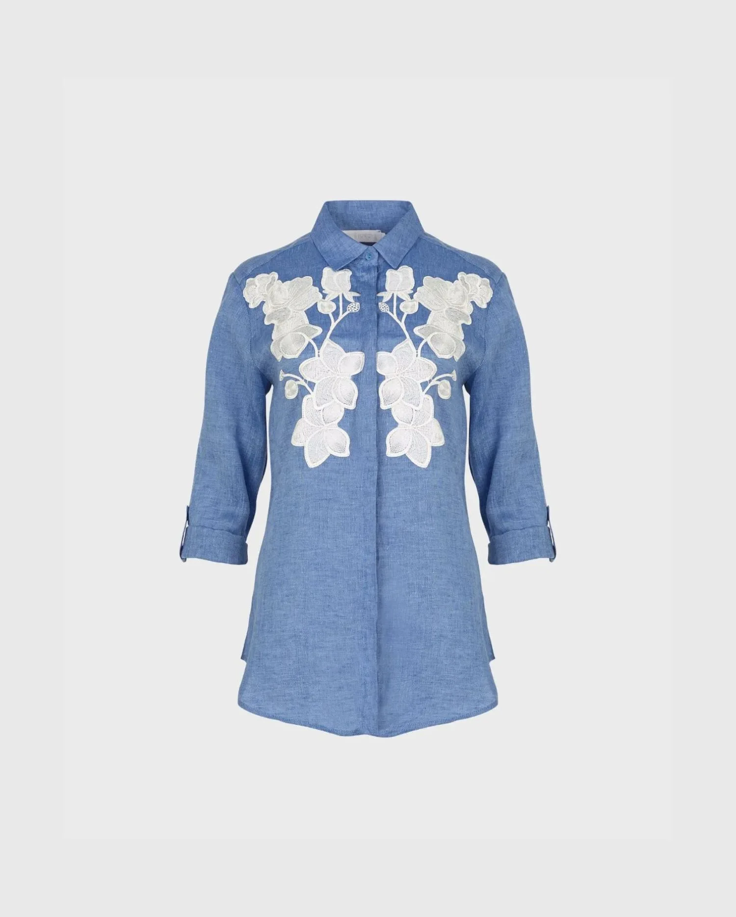 Discover the Citron Blue Linen Shirt With White Floral Applique from designer ANNE FONTAINE