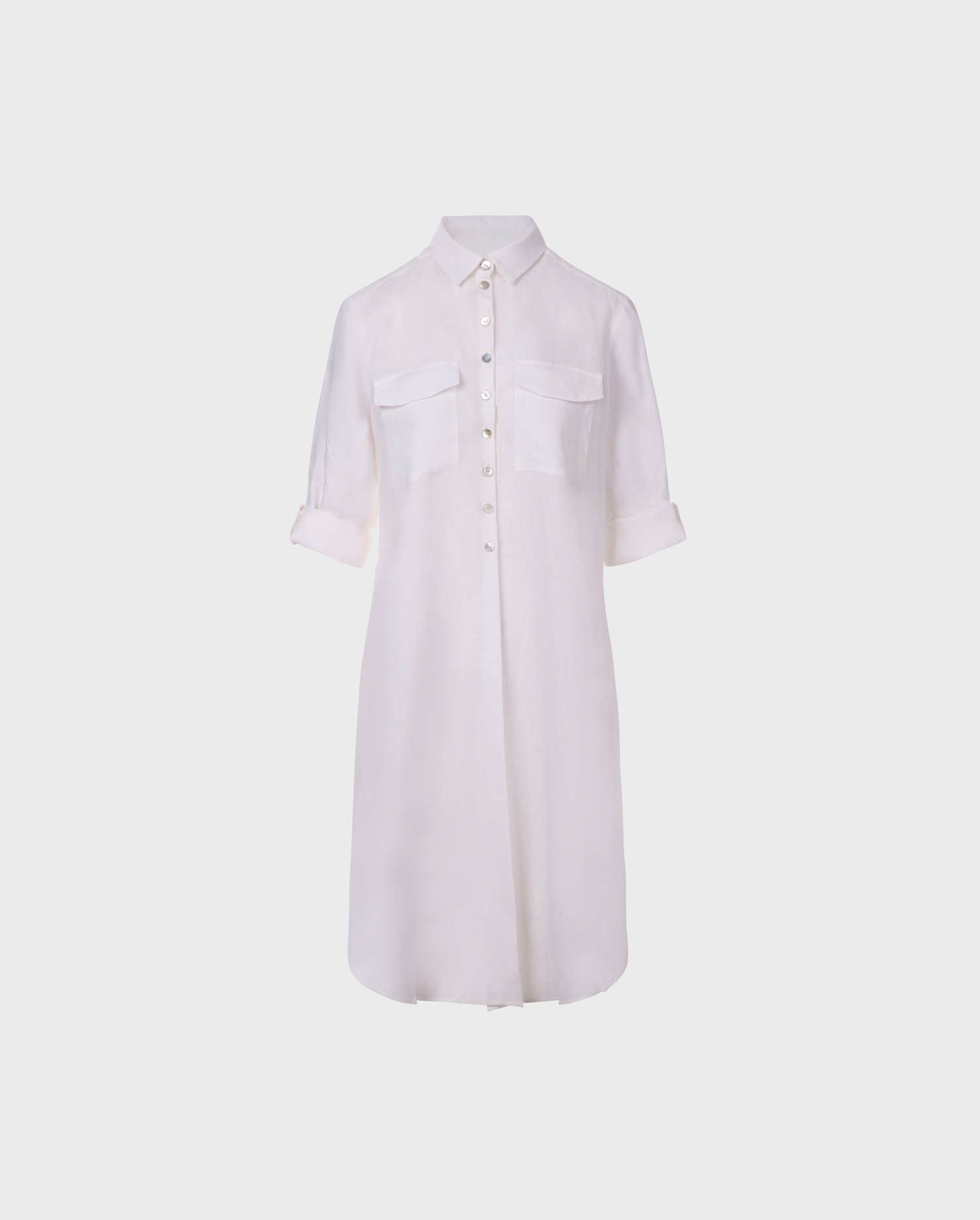 Explore the COMETE long sleeve linen tunic length shirt with split sides and mother of pearl button detail from ANNE FONTAINE