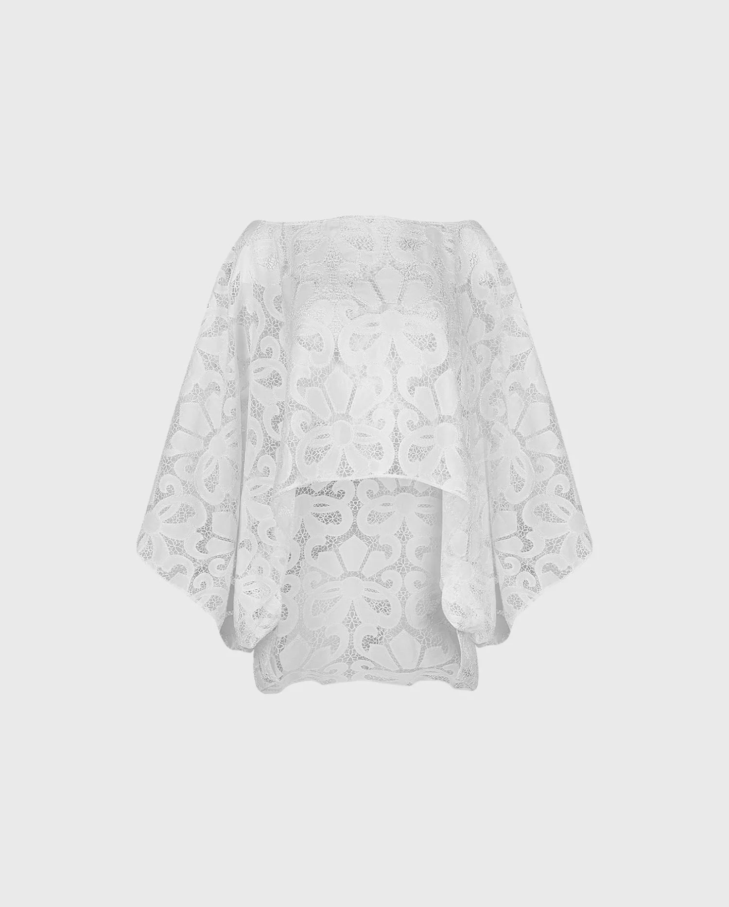Discover the Corinne White Oversized Hi-Low Sheer Lace Blouse With Floral Pattern from designer ANNE FONTAINE