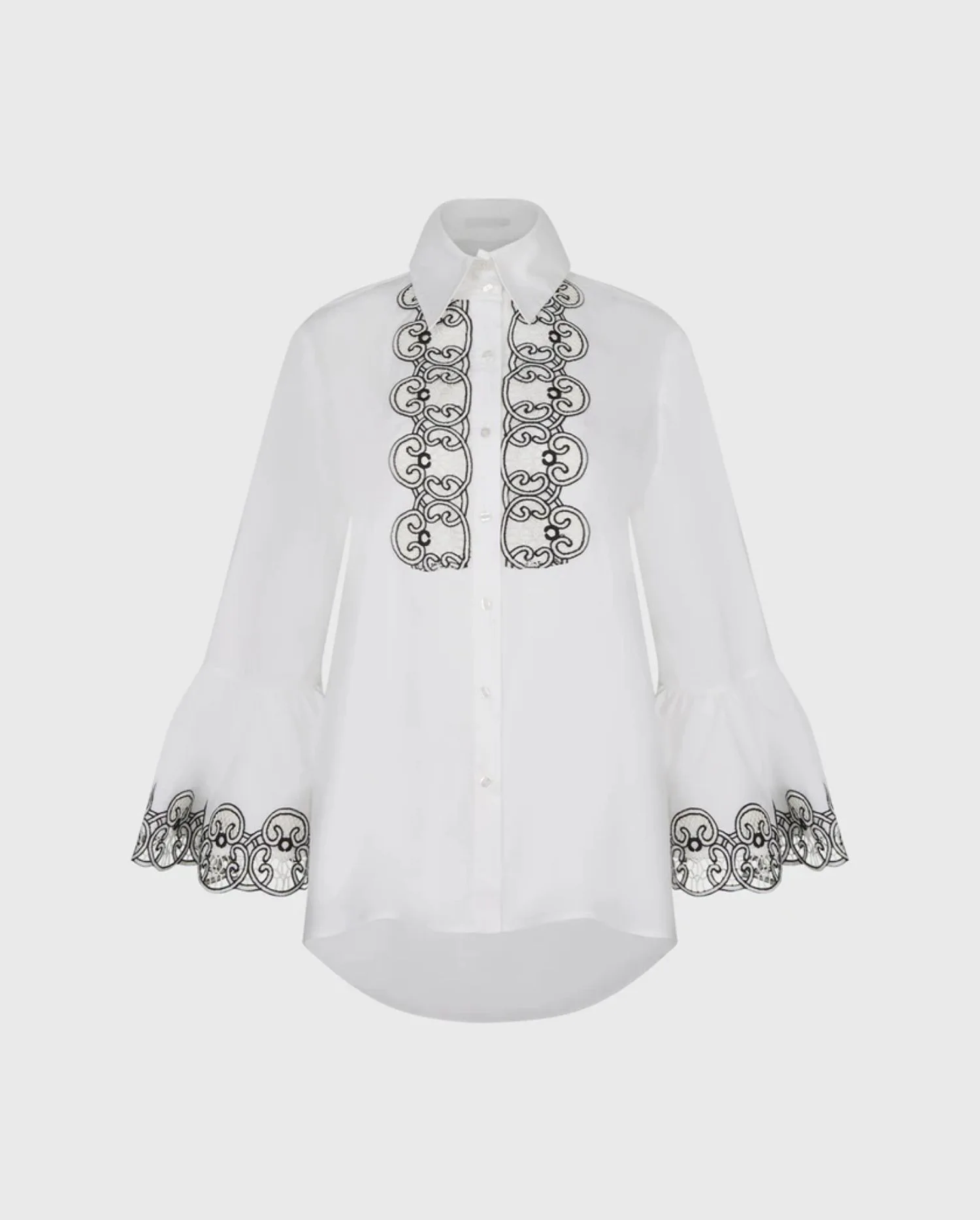 Discover the DOJA White Cotton Tunic Length Designer Shirt With Hi-lo Hemline & Black & White Scrolling Applique by designer ANNE FONTAINE 