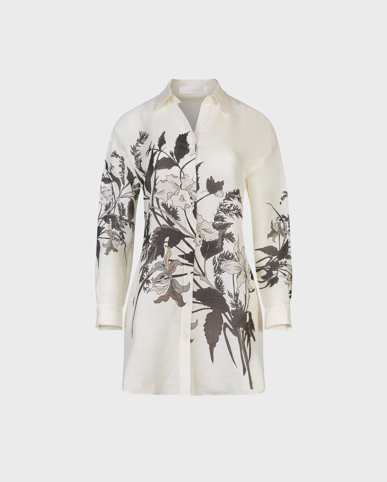  Shop the FELISA long sleeve oversized white shirt with black floral design from ANNE FONTAINE