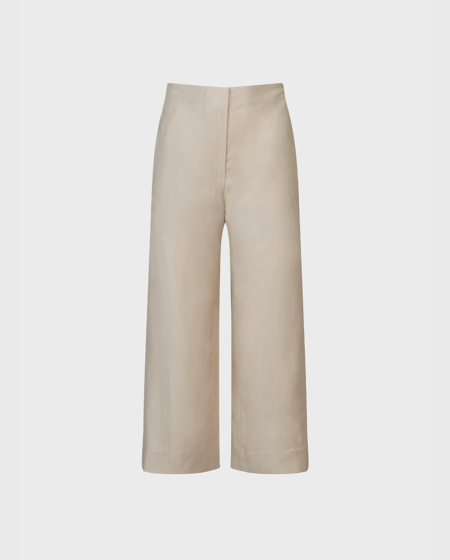 Explore the INAKI wide leg cropped natural colored linen pants with optional belt loops and faux pocket detail from ANNE FONTAINE