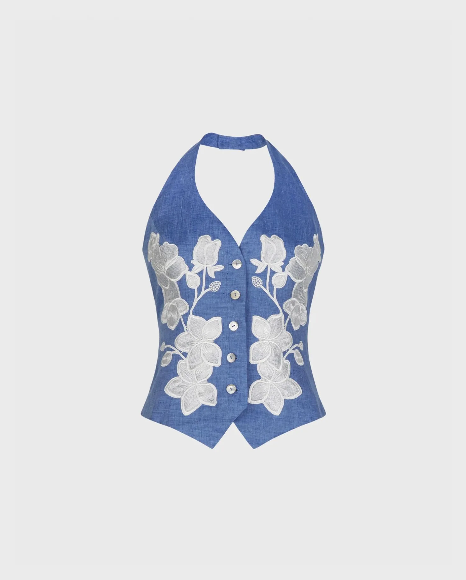 Discover the Iona Chambray Blue Linen Vest With Floral Embroidery And Pearl Button Detailing from designer Anne Fontaine