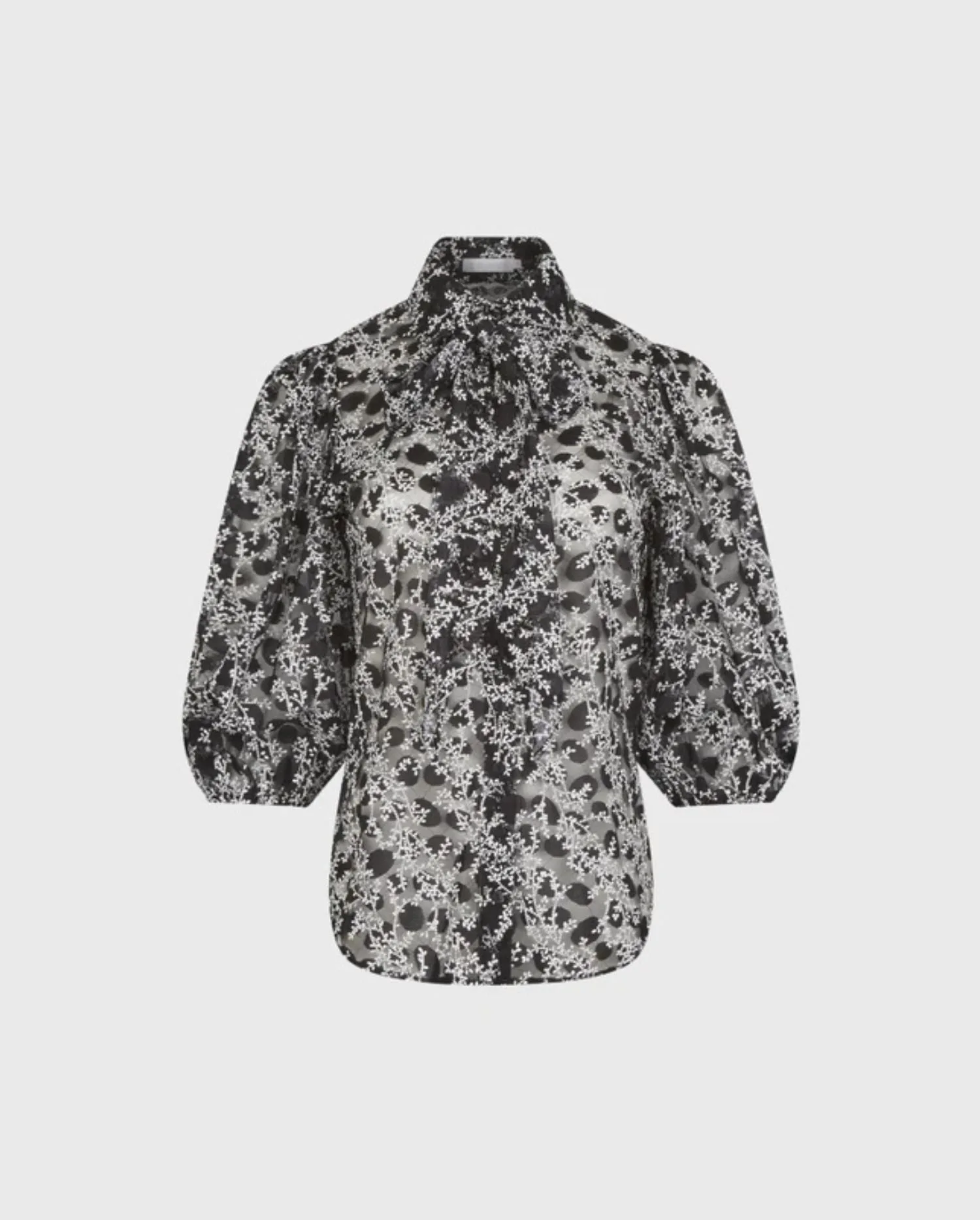 Discover the JACINTA Black 3/4 Sleeve Sheer Shirt Featuring White Floral Applique and Removable Necktie by designer ANNE FOTNAINE