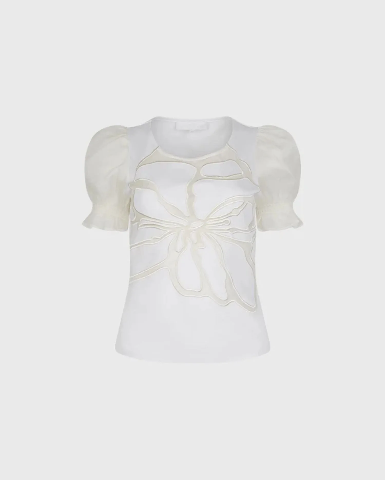 Discover the NEERA White Short Sleeve Pullover Top With Sheer Mesh Sleeves and Sheer Embroidered Floral Design by designer ANNE FONTAINE