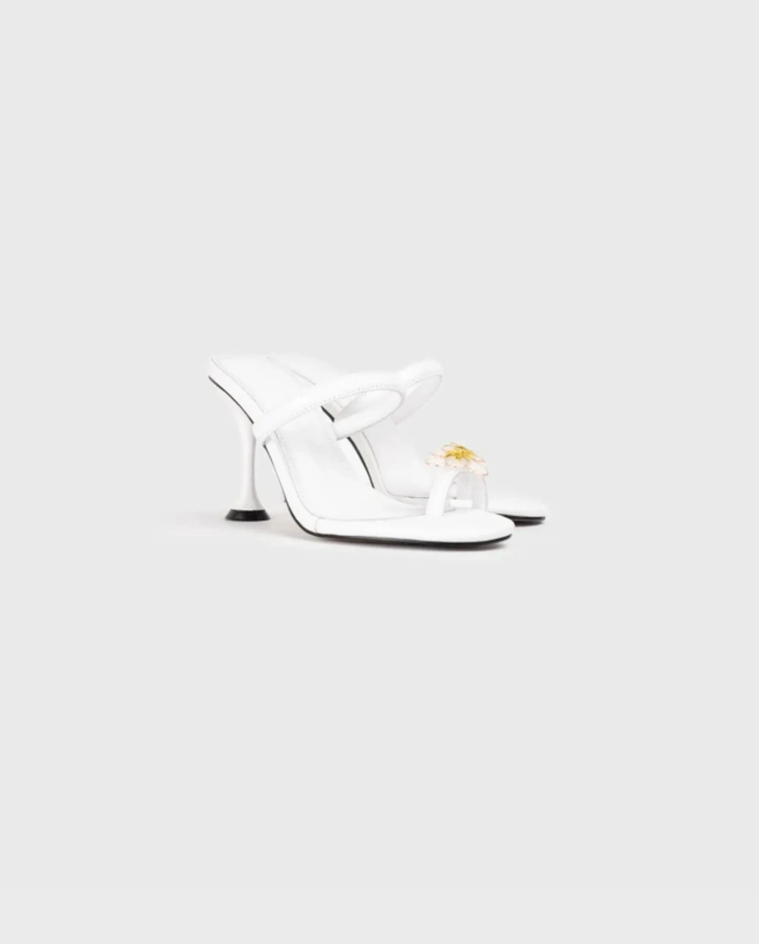 Discover the AZNAR White Heel Sandal With Floral Toe Ring by designer ANNE FONTAINE