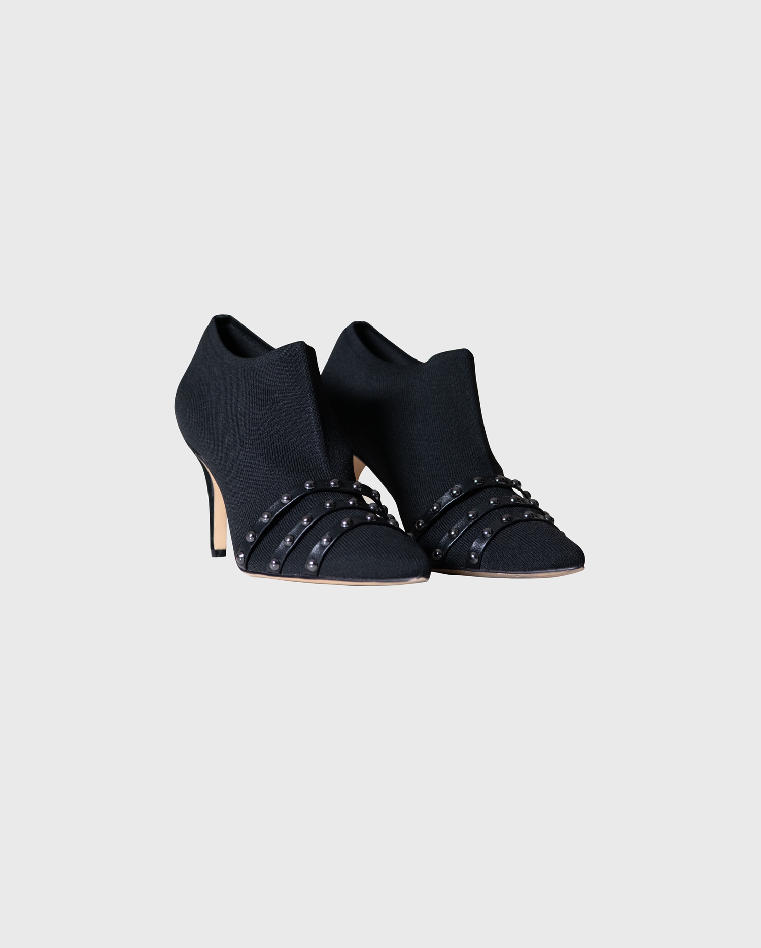 Add the studded black MUSICAL booties to your look of rocker chic