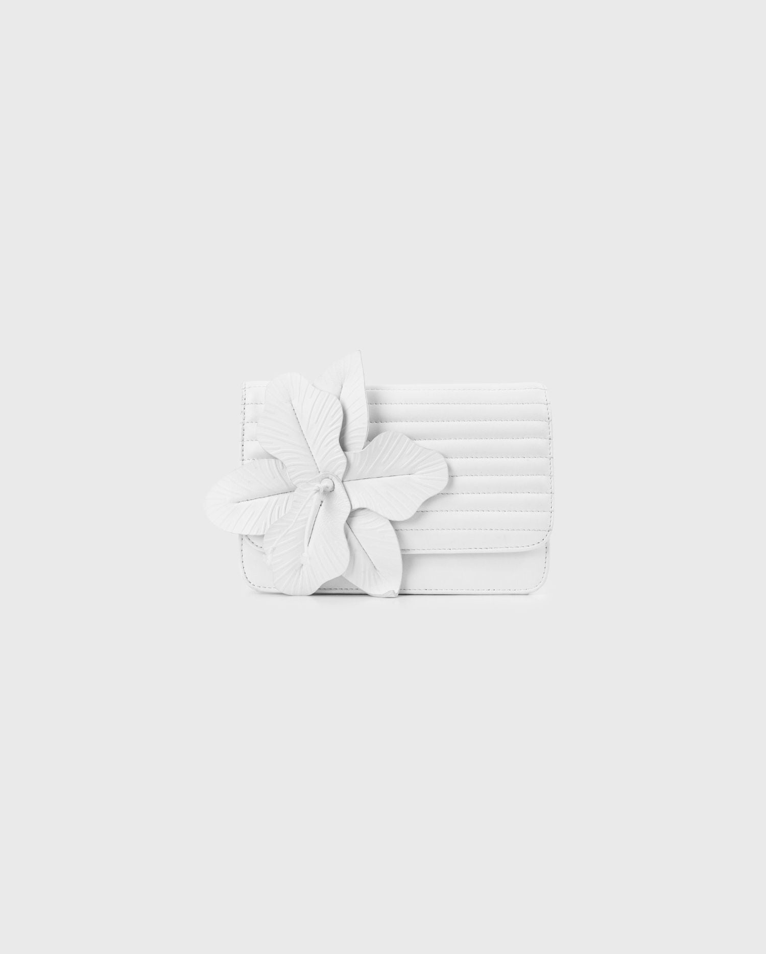 Shop the White Nicki Leather Handbag With a Large Flower from designer Anne Fontaine