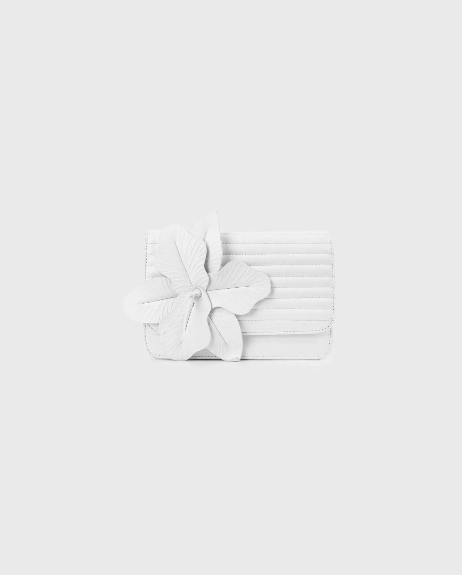 Discover the Nicki White Leather Handbag With a Large Flower designer ANNE FONTAINE