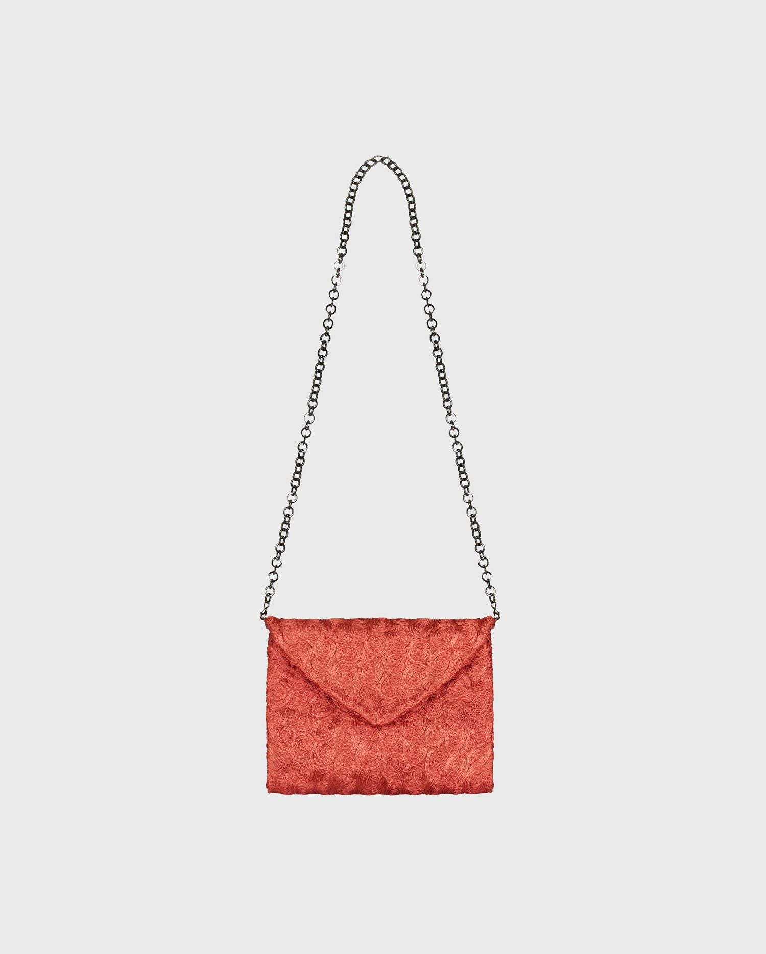 The red floral envelope NINA-PLT handbag will a pop of color to your look with ease