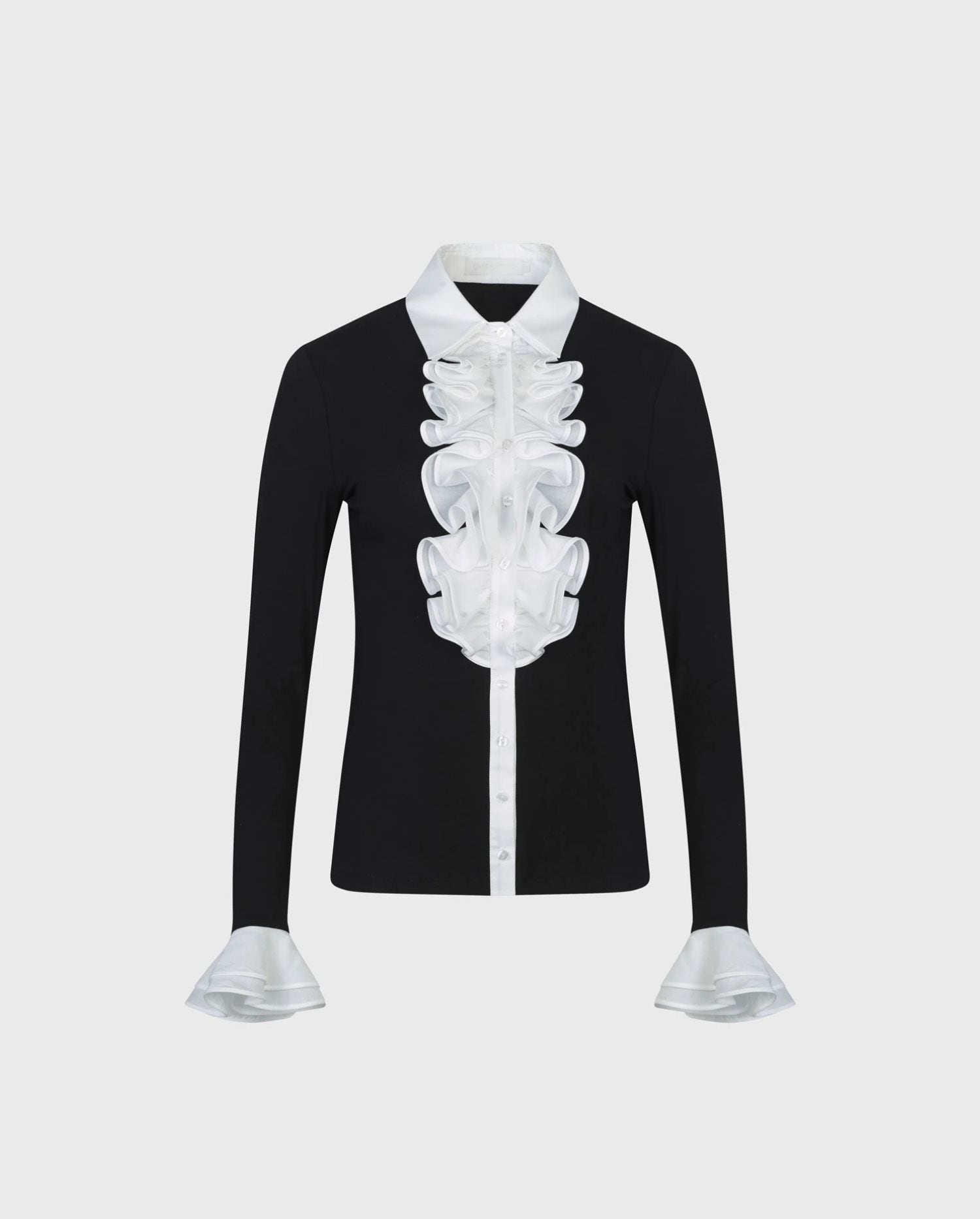 Discover the Patsy Black Jersey Shirt With White Ruffle Details from designer ANNE FONTAINE
