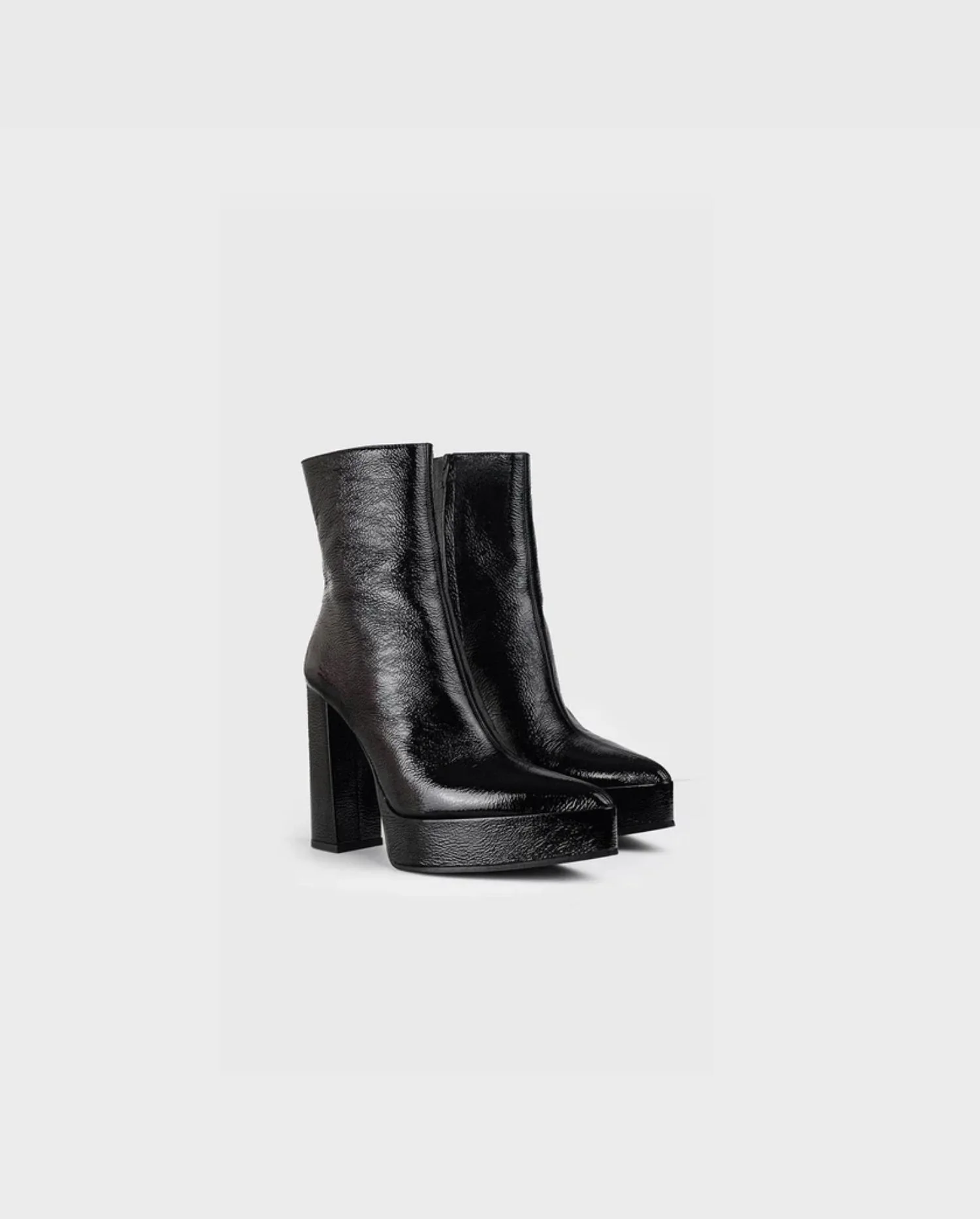 Discover the ADEN Black Patent Leather Boots with Pointed Toe and Platform Heel by designer ANNE FONTAINE 