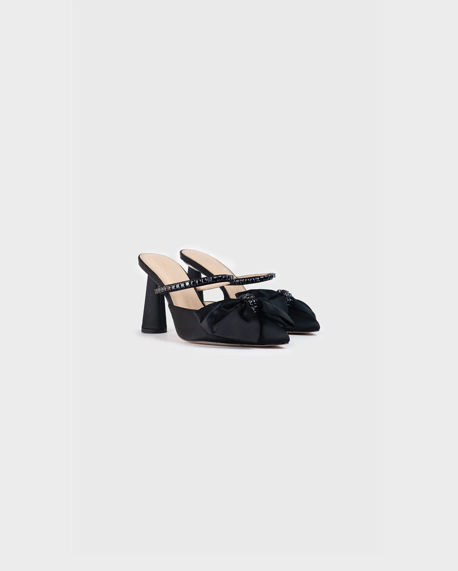 Discover the Revue Open Back Heel With Bow and Crystal Details from designer ANNE FONTAINE
