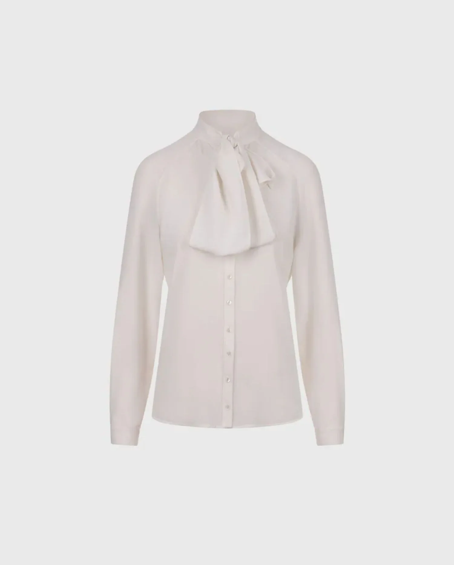Discover the SANTANA White Bow Shirt in Crepe With Pointed Collar and Button Closure by designer ANNE FONTAINE 