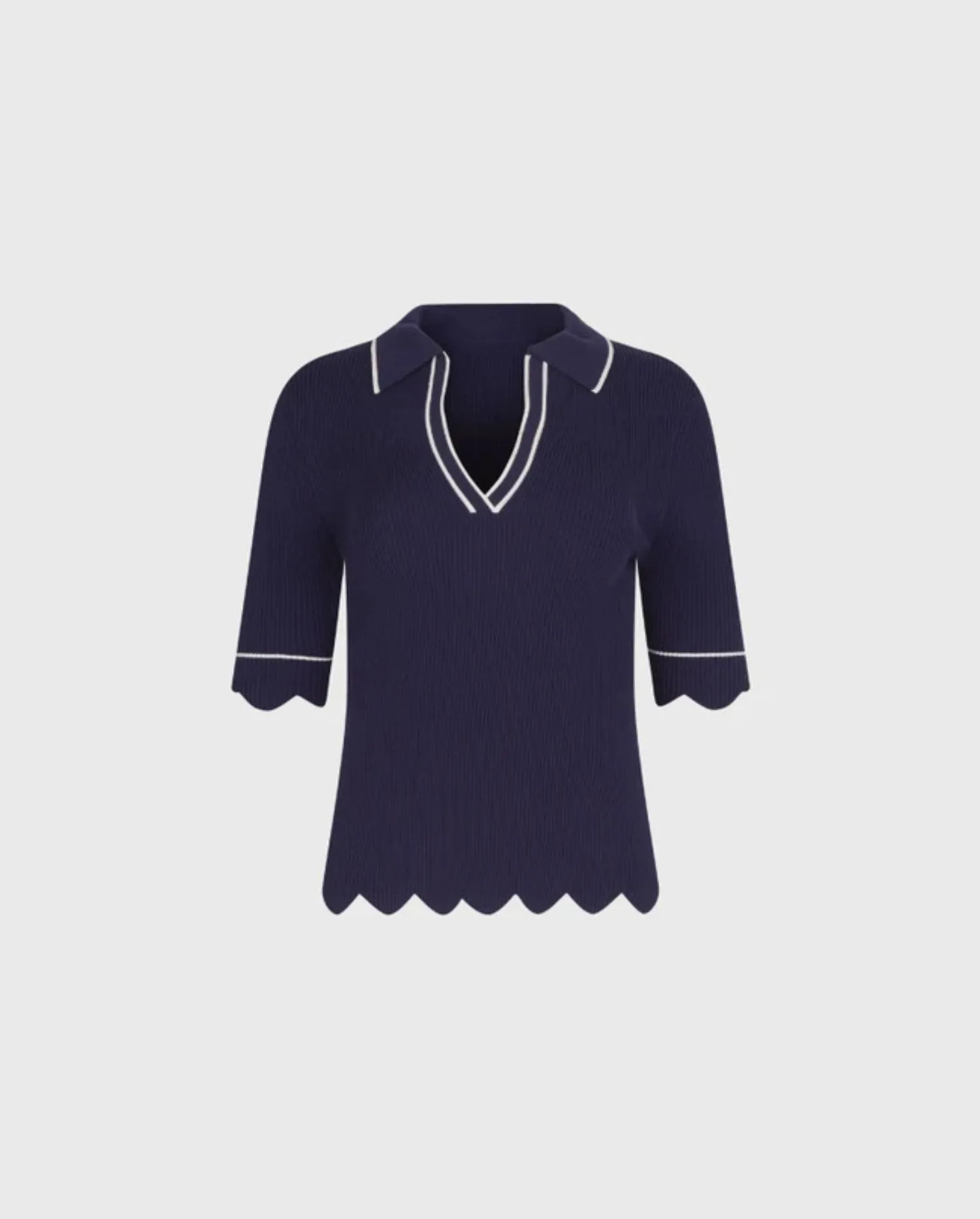 Discover the SARITA Navy 3/4 Sleeve Knit Pullover Top With V-Neckline, Scalloped Hem and White Contrasting Piping by designer ANNE FONTAINE