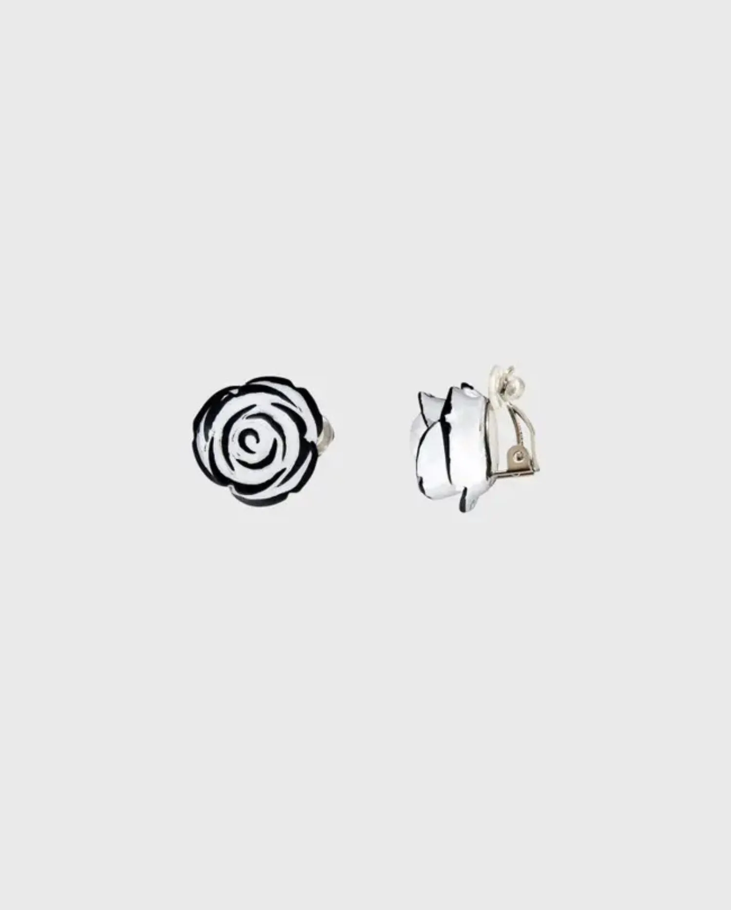 Discover the FIORA White & Black Flower Clip-on Earrings by designer ANNE FONTAINE