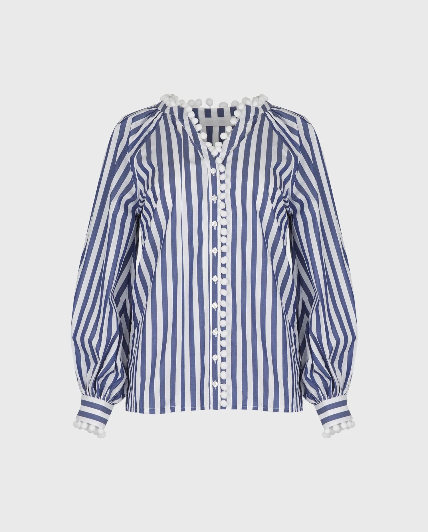 Discover the NELLI Blue and White Thin Striped Poplin Shirt With Pom-Pom Embellished Neckline and Front Placket by designer ANNE FONTAINE