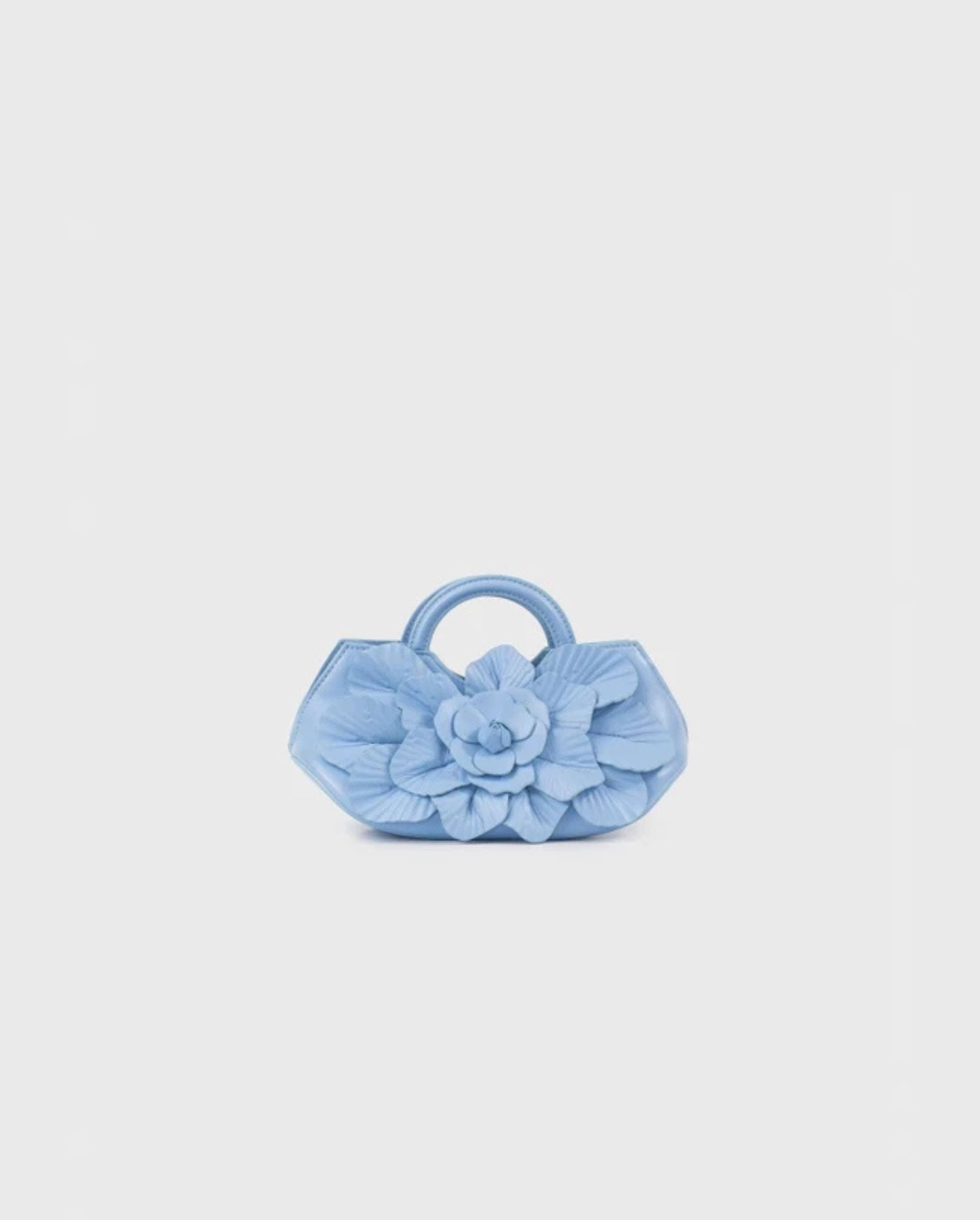 Discover the SCARLETT Signature Leather Mini Floral Handbag in Riviera Blue by designer ANNE FONTAINE