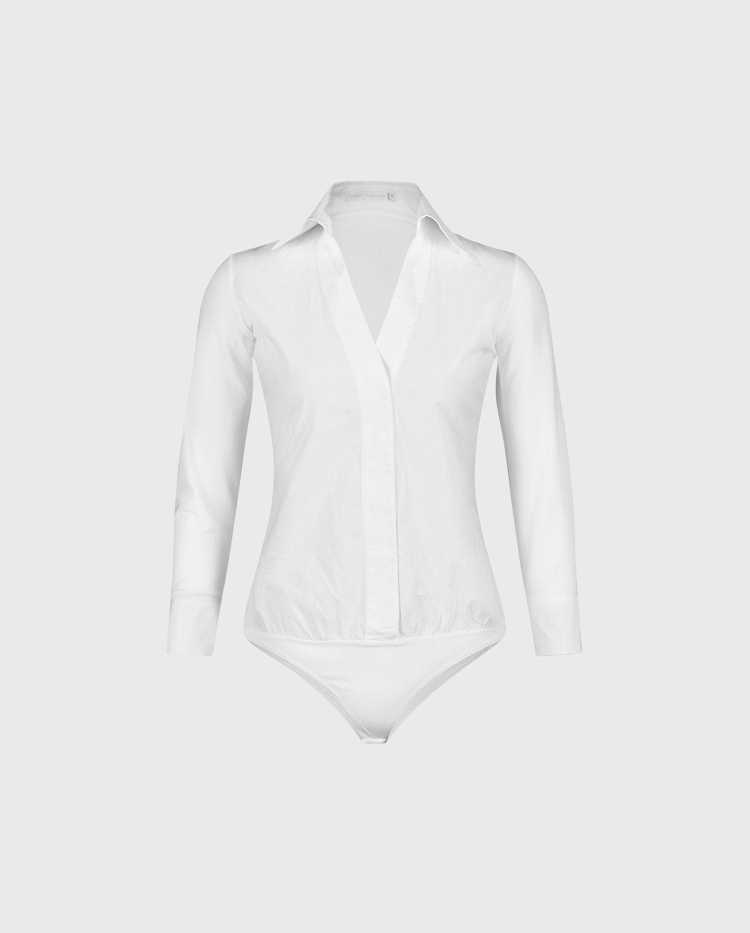 The VERENE white bodysuit with a collar is the perfect base to add to your effortless chic styling.
